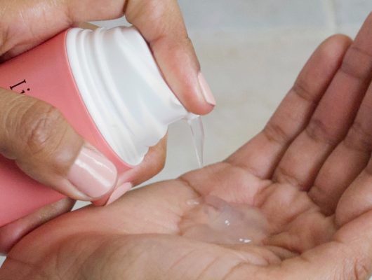hair product being applied to a person's hand