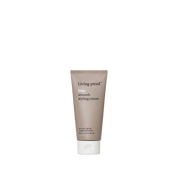 A taupe tube of No Frizz Smooth Styling Cream with a white cap stands upright against a white background. The label, in white text, highlights the product name and its frizz control benefits for medium hair.