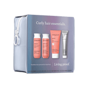 The Curl Curly Hair Essentials gift set includes four products for frizz-free curls, shown in front of a light blue zippered cosmetic bag.