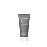 A gray tube of Perfect hair Day™ 5-in-1 Styling Treatment, 60 ml (2.0 fl oz), with white text and a white flip-top cap, designed to smooth and protect hair, shown against a plain background.