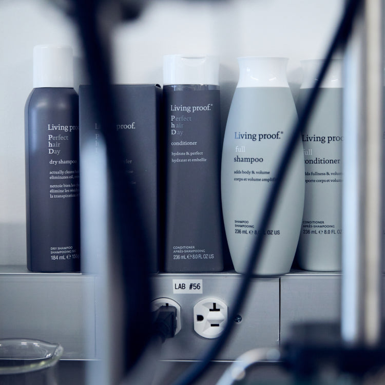 Bottles of Living Proof products, including Perfect hair Day dry shampoo, Full shampoo and conditioner