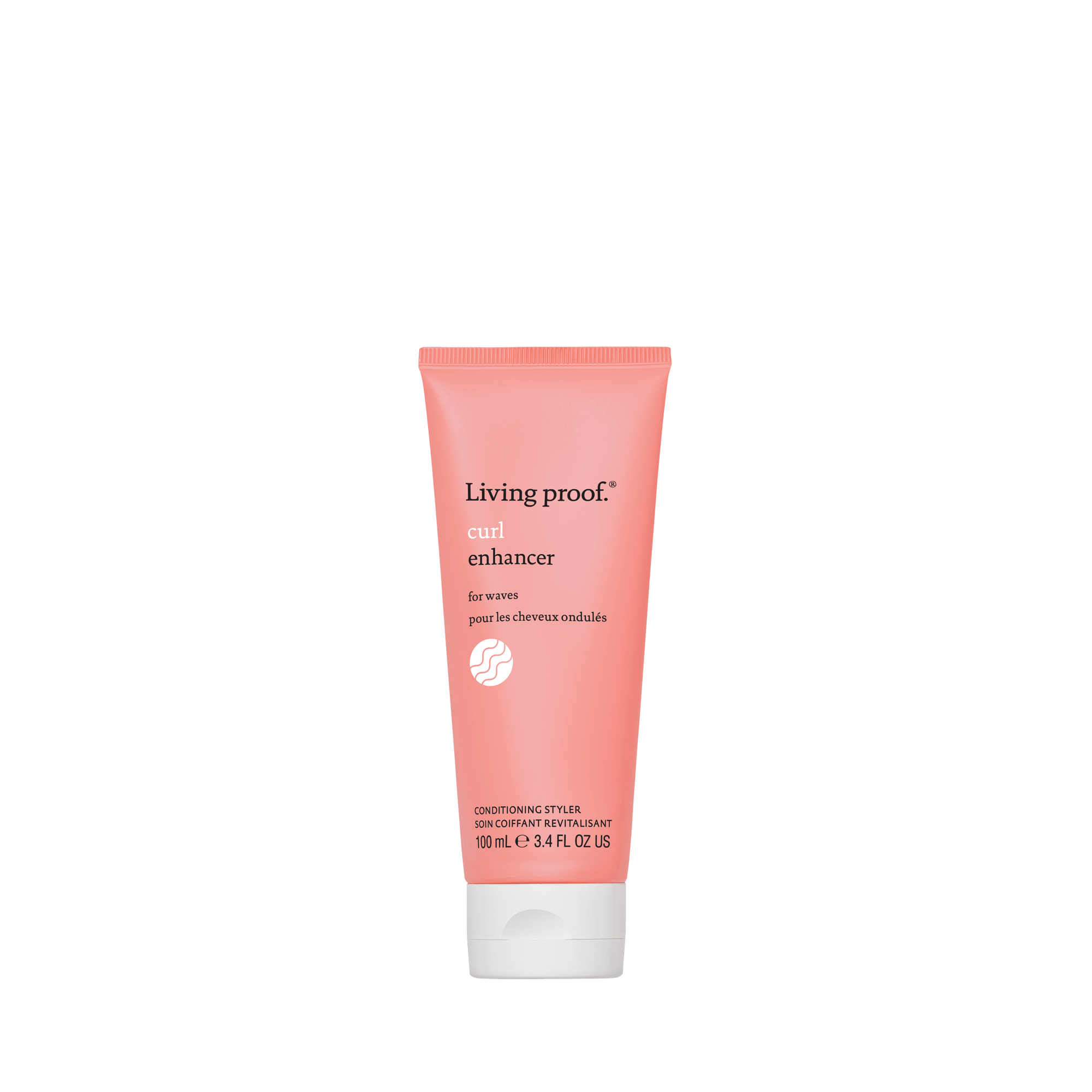 A pink tube of Curl Enhancer for waves stands upright on a white background, featuring frizz protection and a volume of 100 ml (3.4 fl oz US) on its label.
