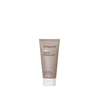 A taupe tube of No Frizz Smooth Styling Cream with a white cap stands upright against a white background. The label, in white text, highlights the product name and its frizz control benefits for medium hair.