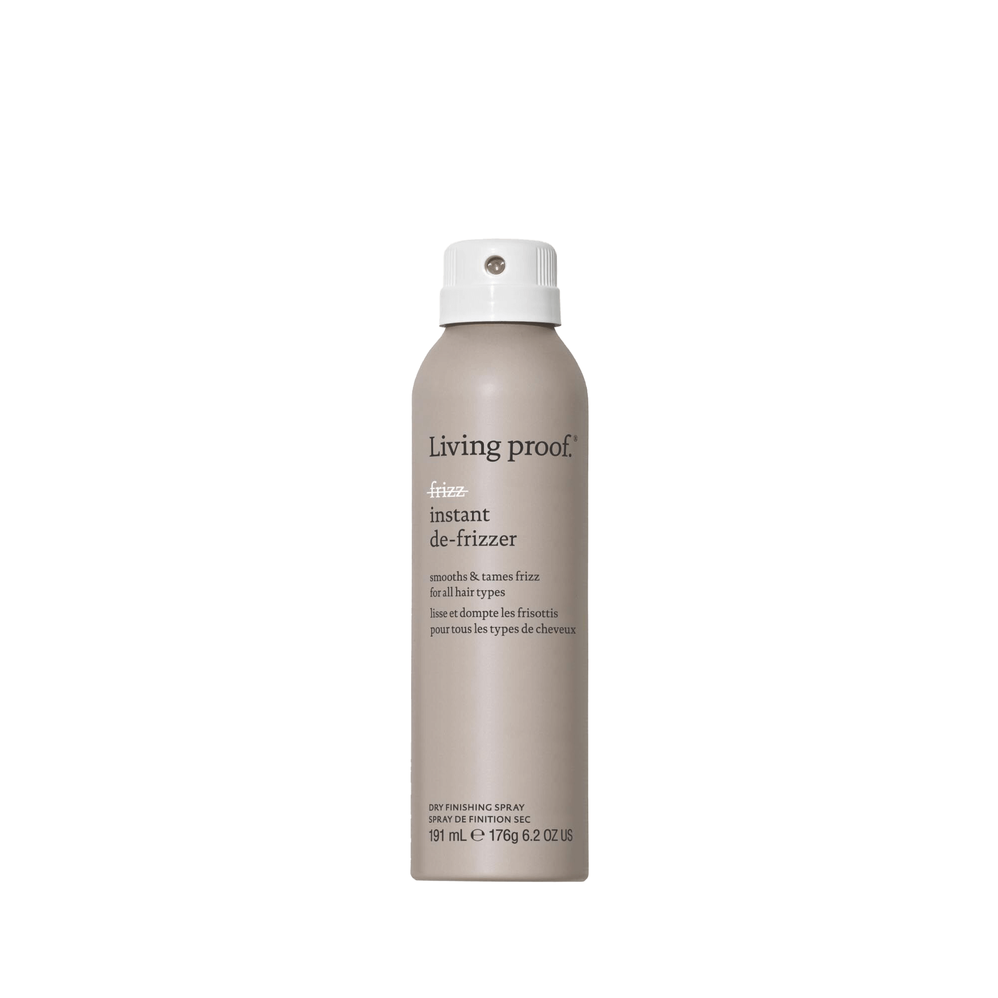 A beige aerosol can of No Frizz Instant De-Frizzer dry conditioning spray with a white cap and black text, shown against a plain white background. Helps fight frizz and restore softness to hair.