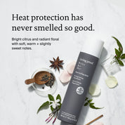 Living Proof hair product with text on heat protection and floral notes, surrounded by decorative elements.