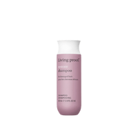 A 2.0 fl oz (60 mL) bottle of Restore Shampoo for damaged hair, featuring Sili-CLONE™ HairTech to help reverse damage. The purple bottle has a white cap and silver text.