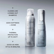 Two frosted bottles from The Style Refresh Set by Living Proof stand upright on a gray surface. Text beside them highlights key benefits: cleans like dry shampoo, adds softness and shine, provides thermal protection, and refreshes your style in minutes—making this the perfect duo for your next holiday set or misting routine.
