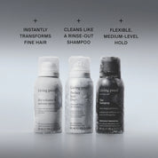 Three Living Proof hair product sprays—Flex Hairspray, Advanced Clean Dry Shampoo, and Dry Volume & Texture Spray from The Travel Essentials Set—stand lightly frosted side by side on a grey background with their descriptions displayed above: volume/texture spray, dry shampoo, and flex hairspray.