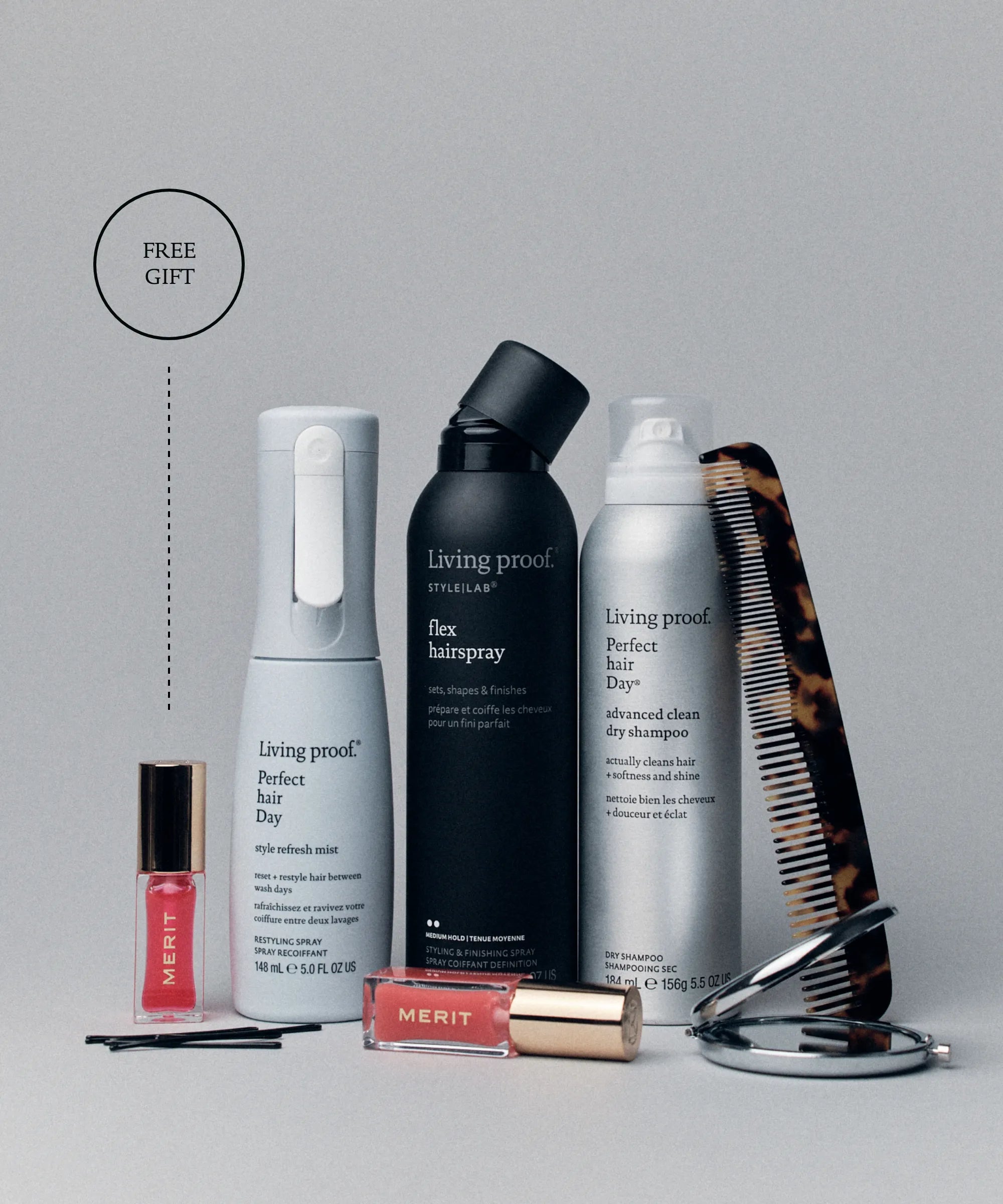 Living Proof hair care products on a gray background