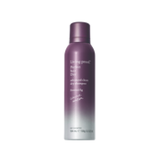A purple and white aerosol can of Perfect hair Day™ Frosted Fig Advanced Clean Dry Shampoo, featuring a limited-edition scent of fig and coconut, stands upright on a white background.