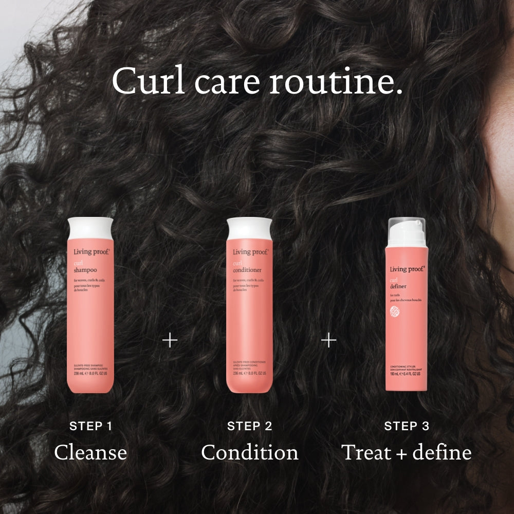 A coral-colored Curl Conditioner bottle is shown against dark, defined curls. Text reads: Curl care routine for all curl types. Step 2: Condition with Curl Conditioner.