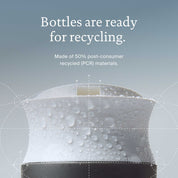Zoomed-in open shampoo bottle with text stating bottles are ready for recycling; made of 50% post-consumer recycled (PCR) materials.
