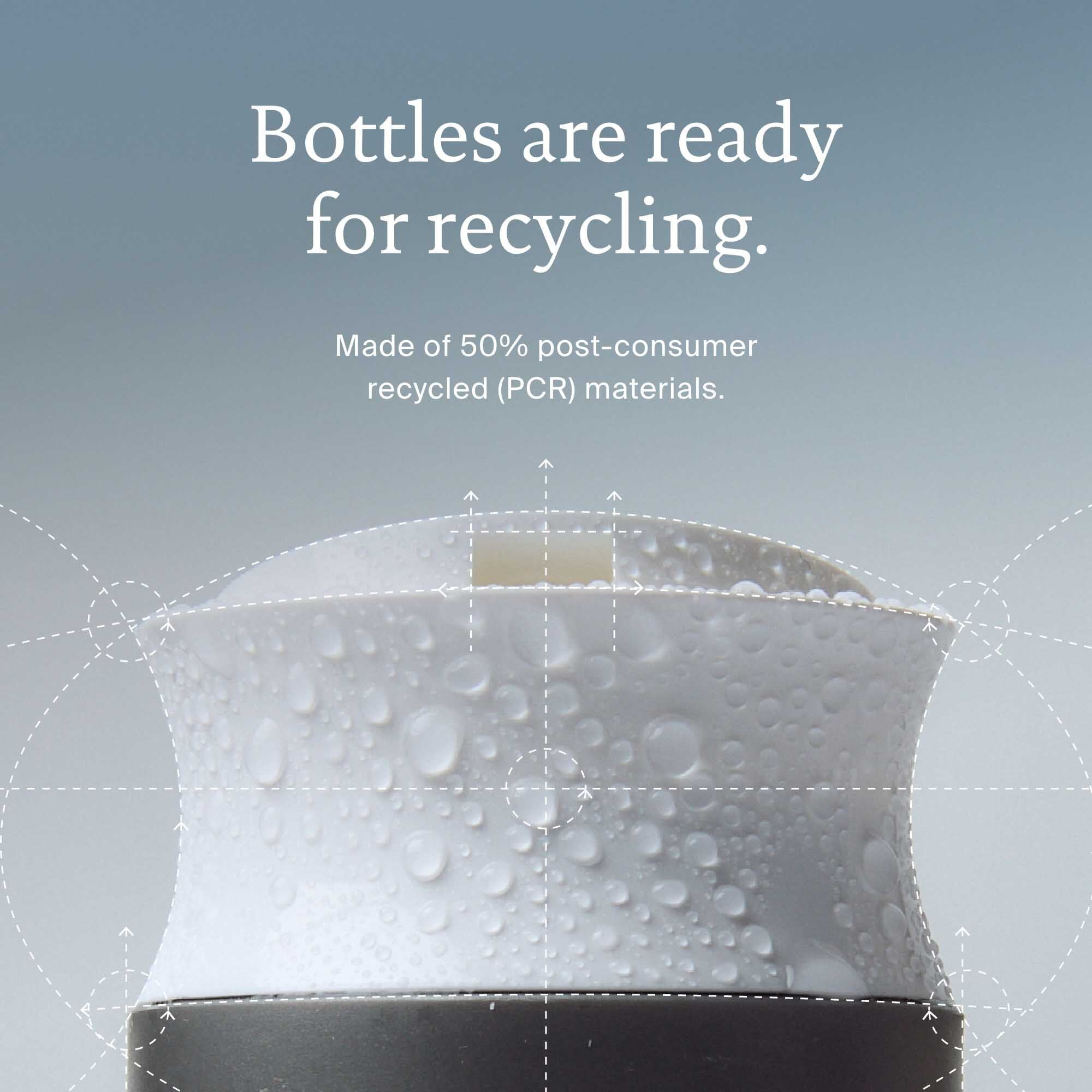 Zoomed-in open shampoo bottle with text stating bottles are ready for recycling; made of 50% post-consumer recycled (PCR) materials.