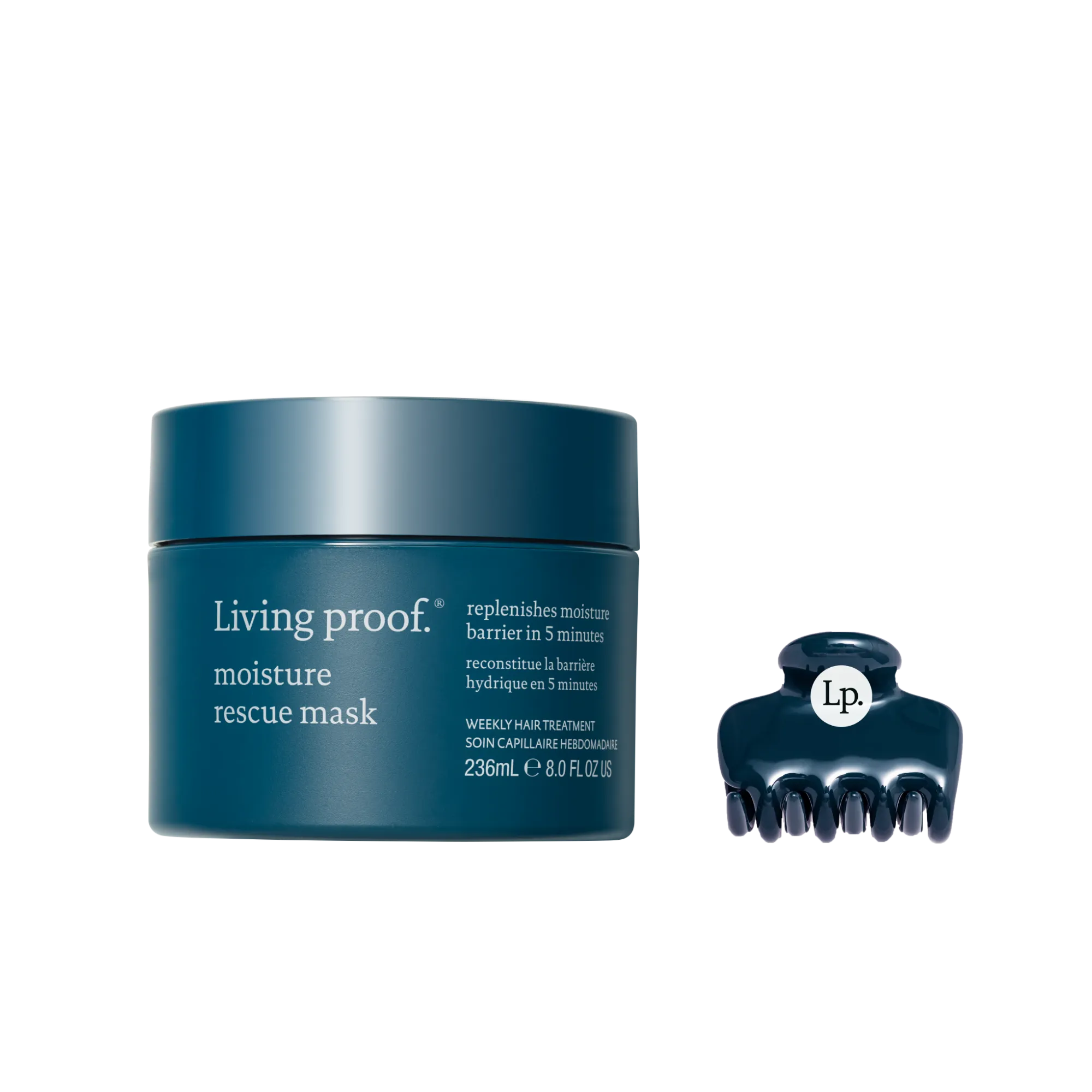 A teal jar of the Moisture Rescue Mask + Claw Clip Bundle is shown, with the mask’s label highlighting hydrating and barrier-replenishing benefits, and a dark teal Living Proof claw clip featuring Lp. printed on it beside the jar.