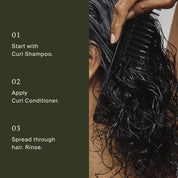 A person uses a wide-tooth comb to detangle wet, curly hair. Text explains curly hair care: begin with curl shampoo, then apply Curl Conditioner, spread throughout hair, and rinse.