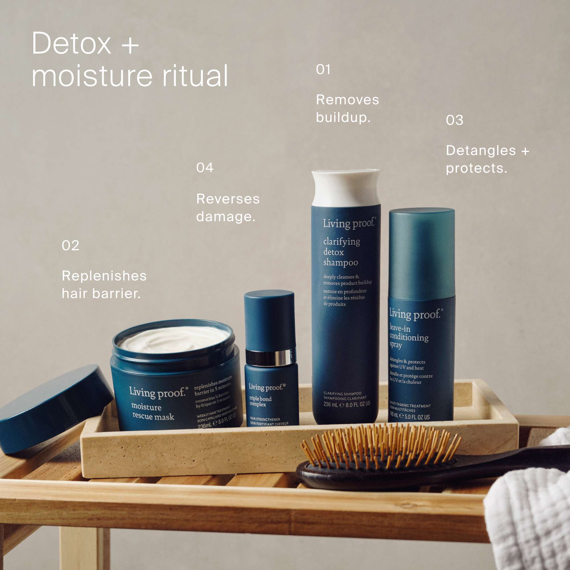 Living proof hair care products on wooden table