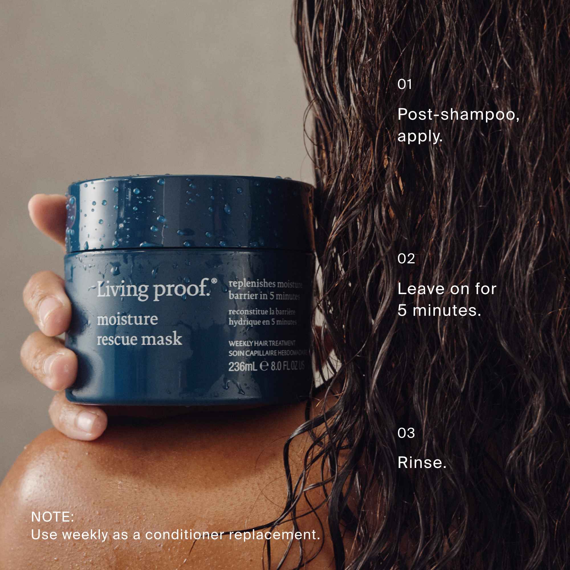 Living Proof moisture rescue mask jar held by a person with wet hair, instructions displayed on the right.