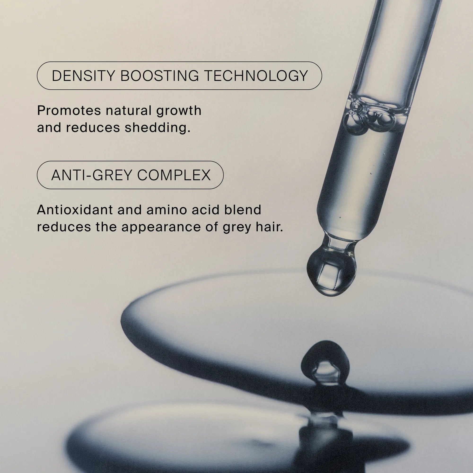 Dropper with liquid and text about density boosting technology and anti-grey complex on a reflective surface.
