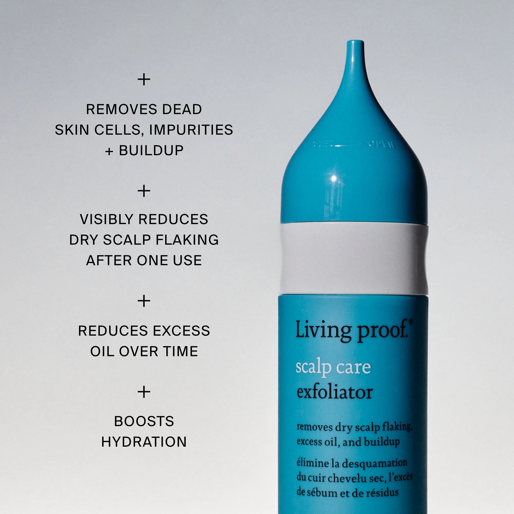 A blue bottle of Scalp Care Exfoliator is shown upright, with text noting its benefits: exfoliates the scalp, acts as a pre-shampoo treatment, reduces flaking, and boosts hydration.