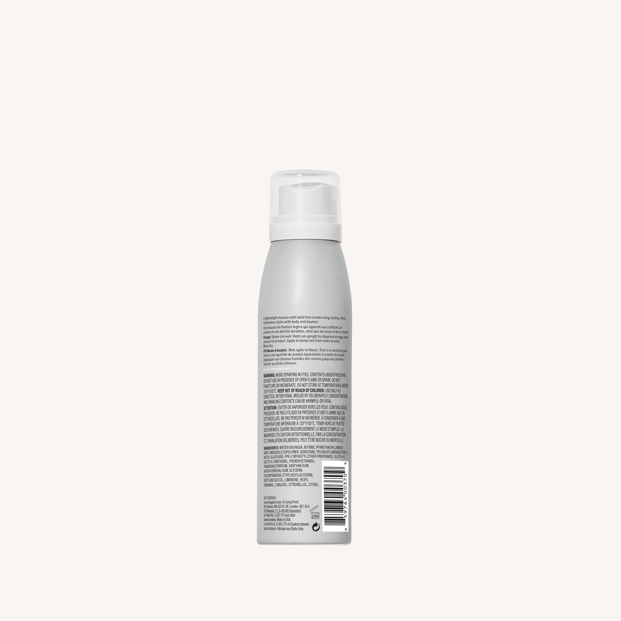 A silver aerosol can of Full Thickening Mousse with a clear plastic cap is shown from the back. Dense black text lists ingredients, usage instructions for flexible hold and volume, plus a barcode near the bottom.