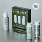 The Full Volume + Texture Set is displayed with three white bottles and a green box. Ideal as travel haircare, the kit features a dry volume spray. A "30% SAVINGS" label is visible. Everything is arranged neatly on a gray background.