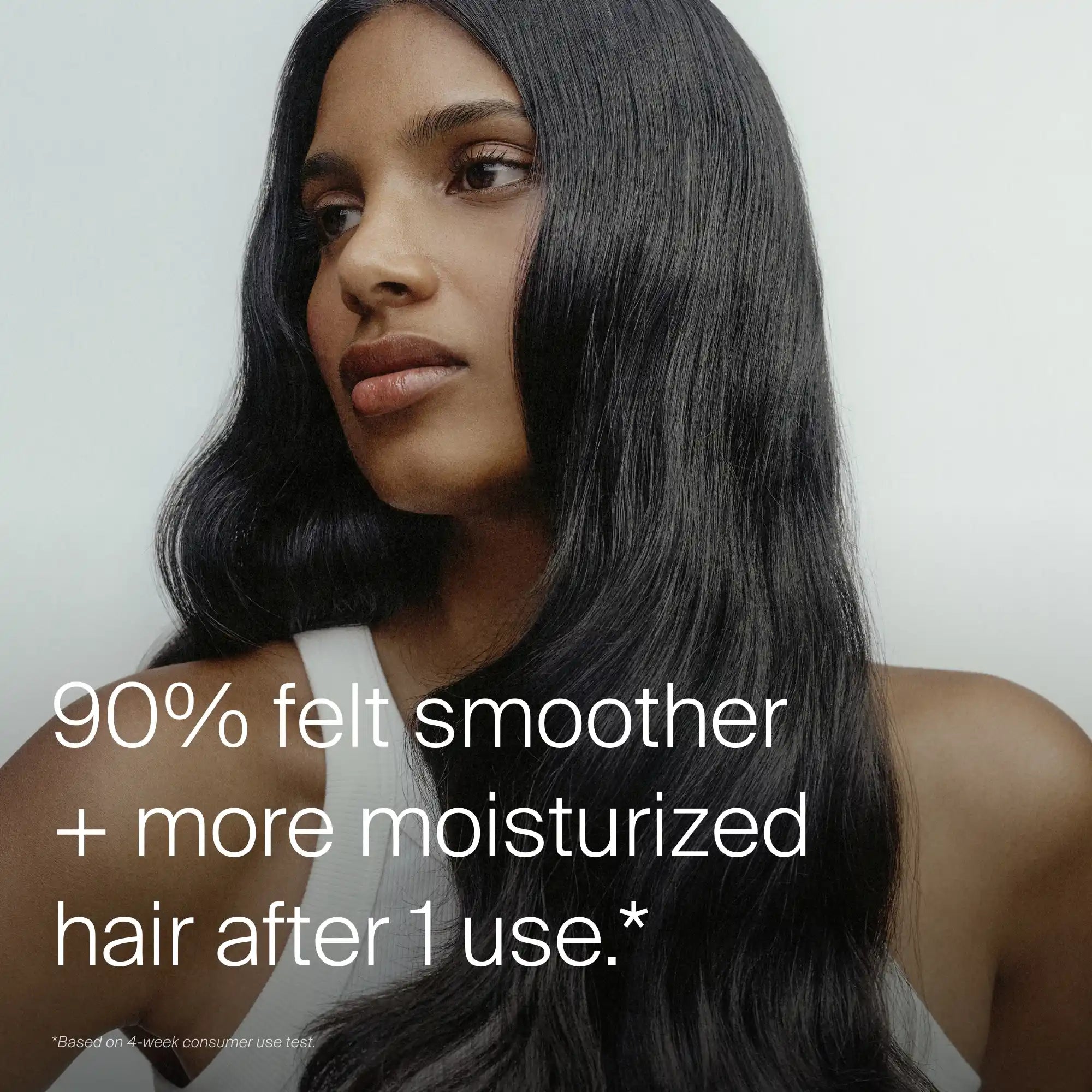 A woman with long, shiny black hair looks to the side in a white top. Text reads: 90% felt smoother, more moisturized hair after 1 use* with the Moisture Rescue Mask + Claw Clip Bundle for a stronger moisture barrier.