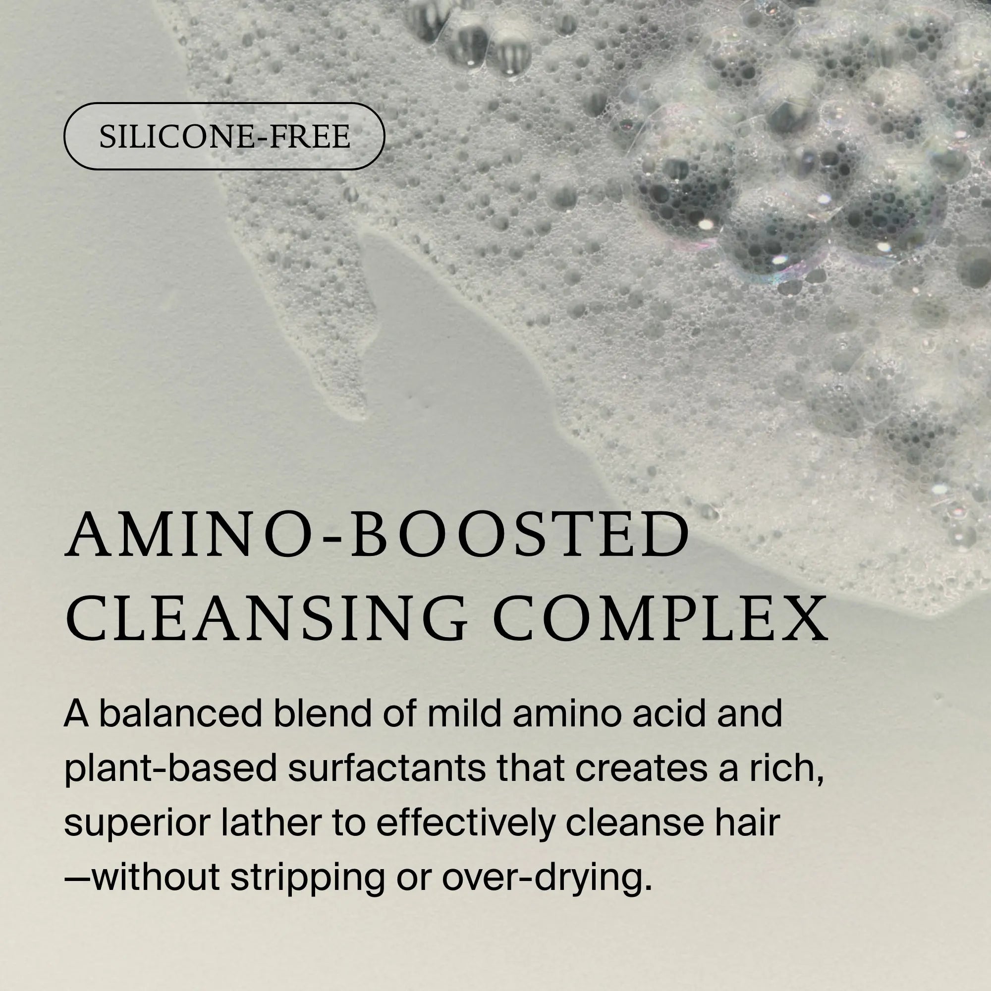 Foamy lather on a light surface highlights Restore Wash Duo’s silicone-free, amino-boosted cleansing complex with Sili-CLONE HairTech: mild amino acids, plant-based surfactants, and no stripping or over-drying.