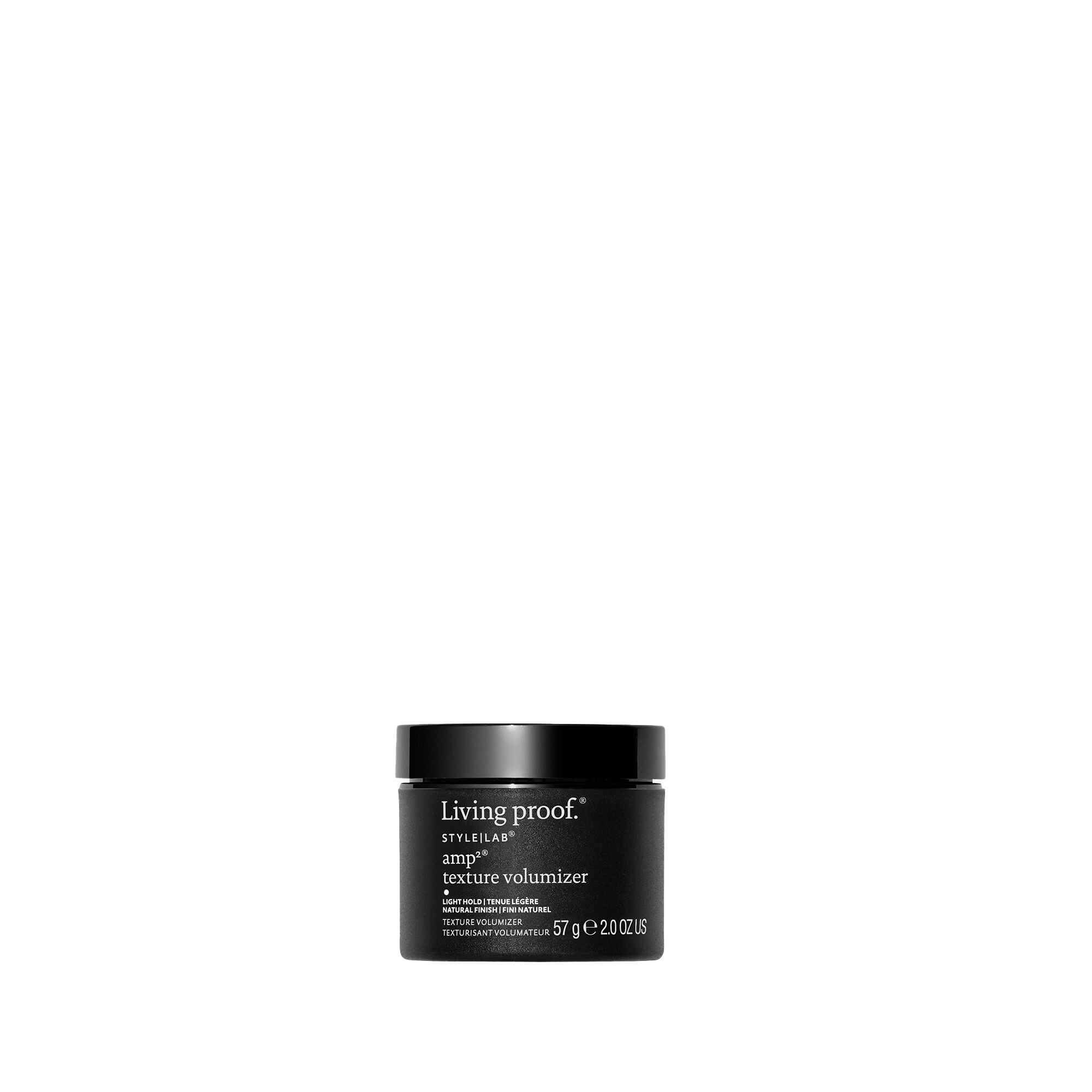 A black jar of Style Lab® amp²® Texture Volumizer, 57g, with white labeling on the front, delivers amplified volume and flexible hold, shown against a plain white background.