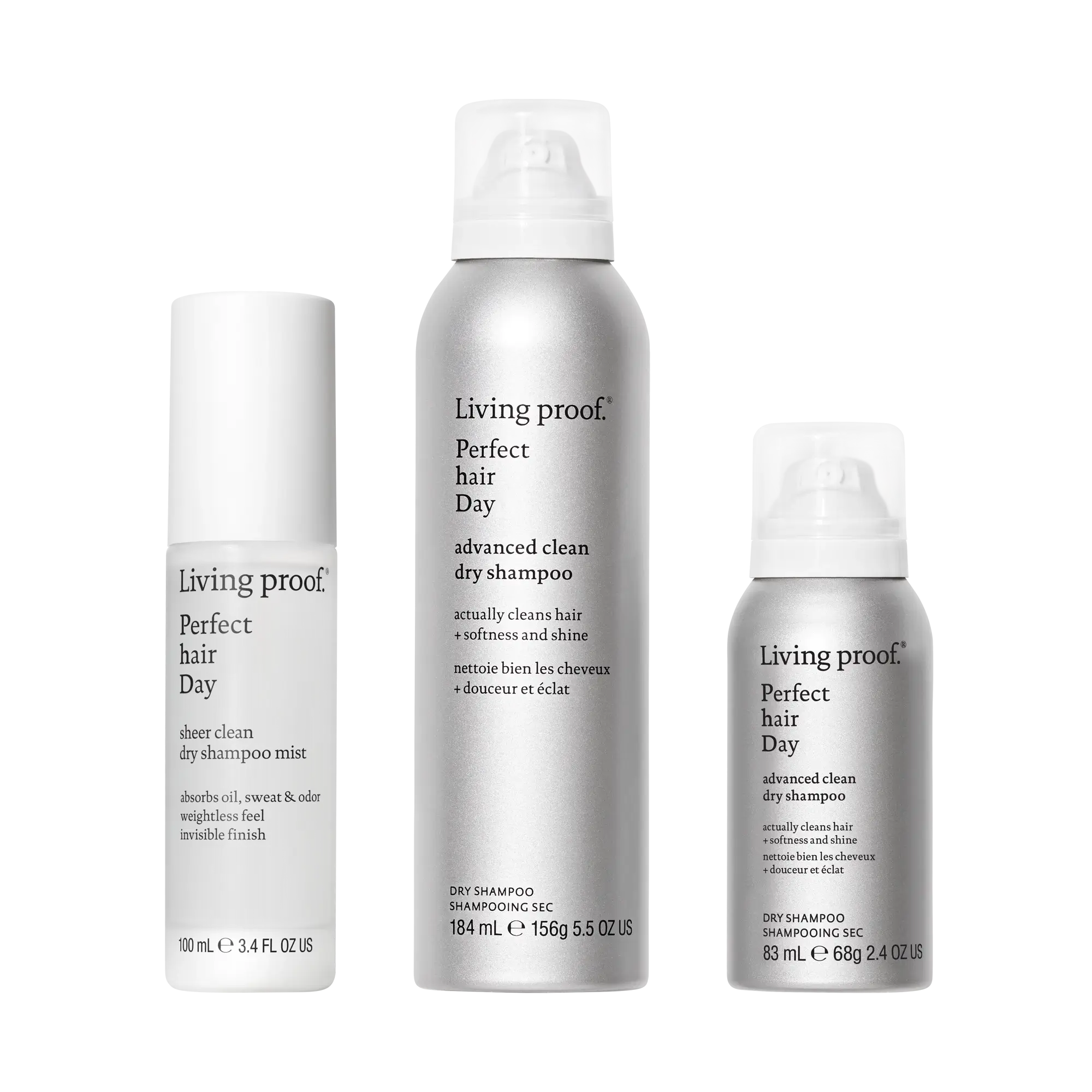 Three silver and white bottles from the Living Proof Choose Your Clean Set—a sheer clean dry shampoo mist, an advanced clean dry shampoo, and a smaller dry shampoo—are displayed with simple, modern labels. Micellar-powered formulas help ensure clean hair without water for refreshed, revitalized style anytime.