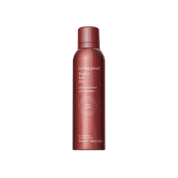 Living proof dry shampoo bottle on a white background