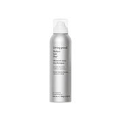 Living Proof dry shampoo bottle on a white background