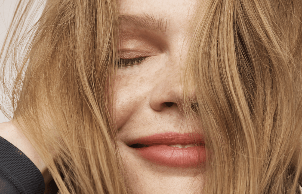 woman smiling with blonde hair