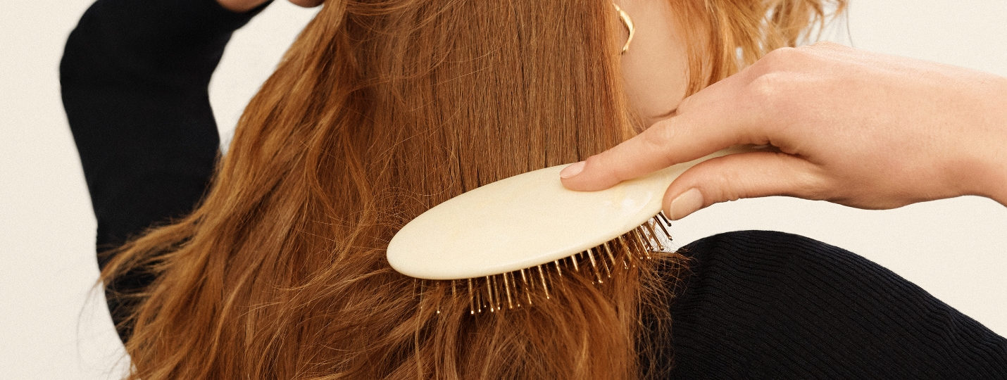 woman-brushing-hair